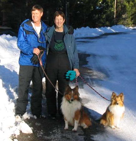 <Picture of Marnix, his wife, and their dogs Linus and Java>